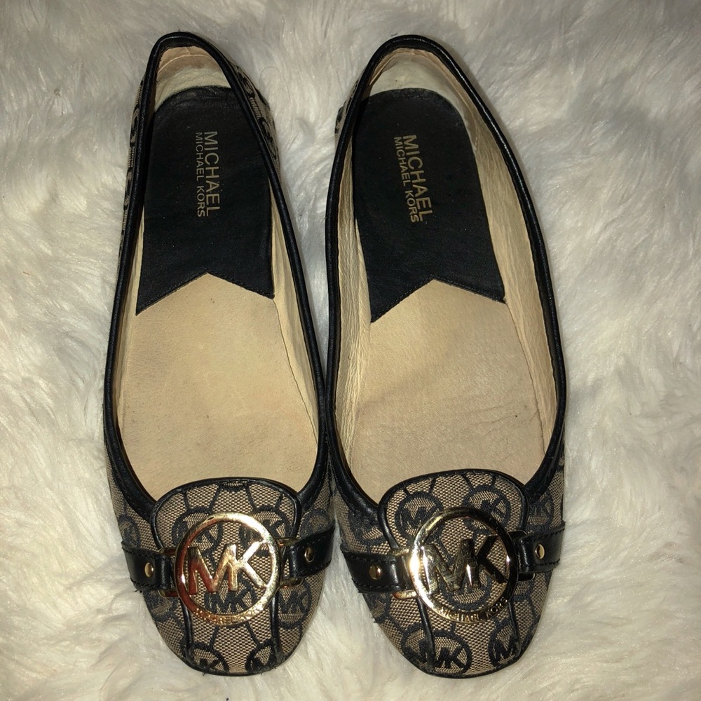 Michael Kors logo flats.
